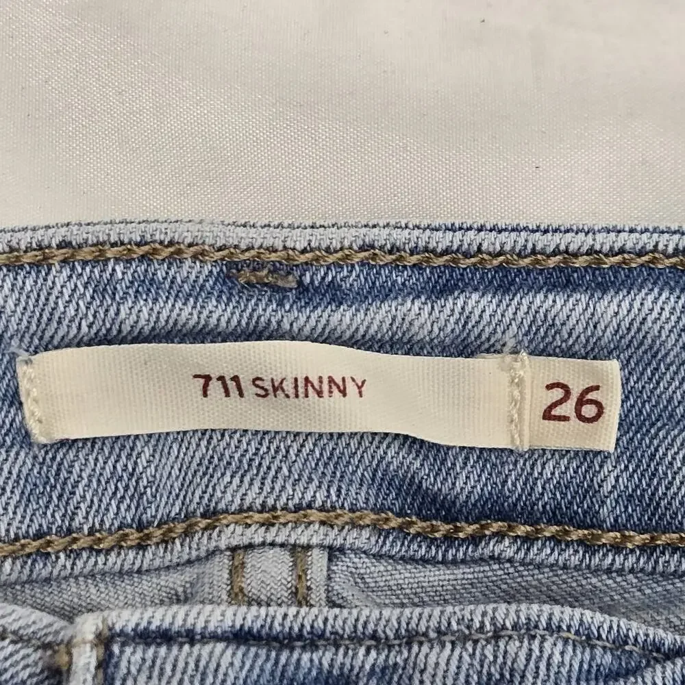 Levi's 711 Distressed Skinny Jeans Size 26 Waist Light Wash Blue